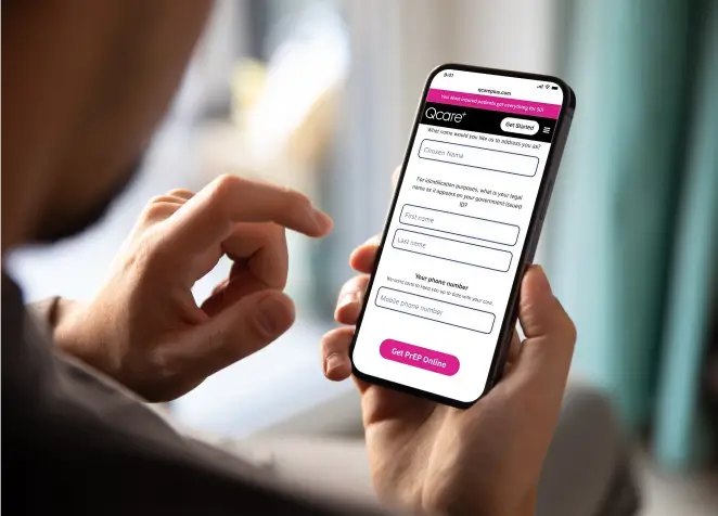 Patient using phone to access Q Care Plus